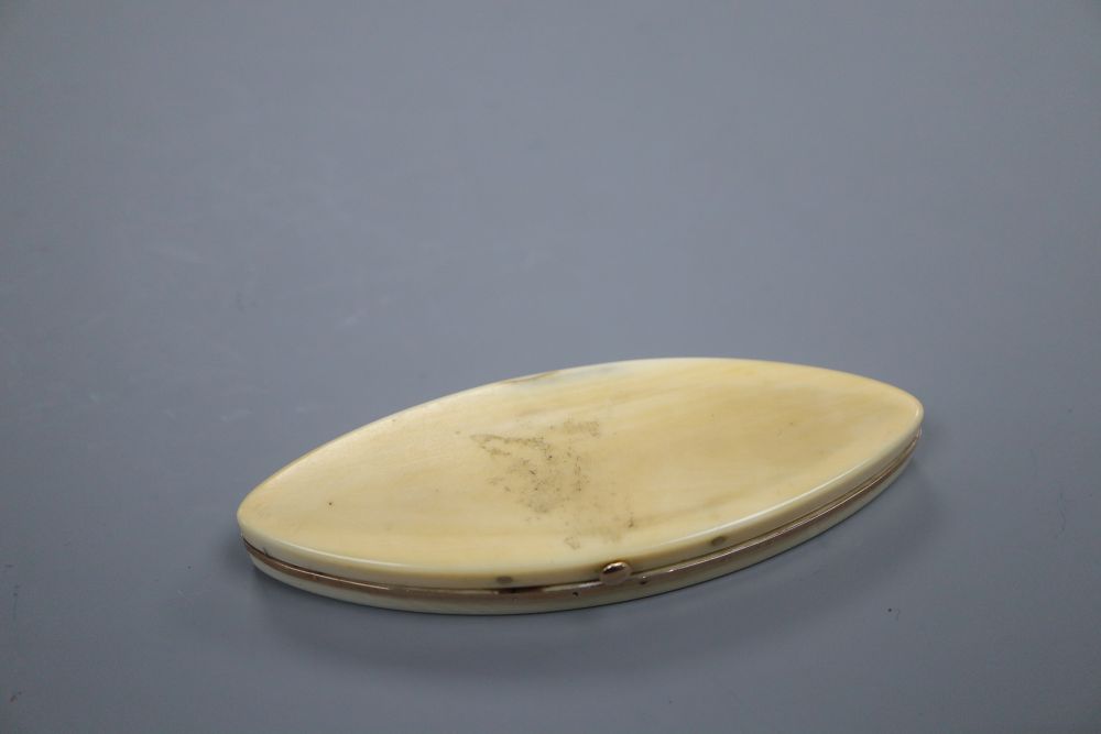 An oval ivory and yellow metal toothpick case